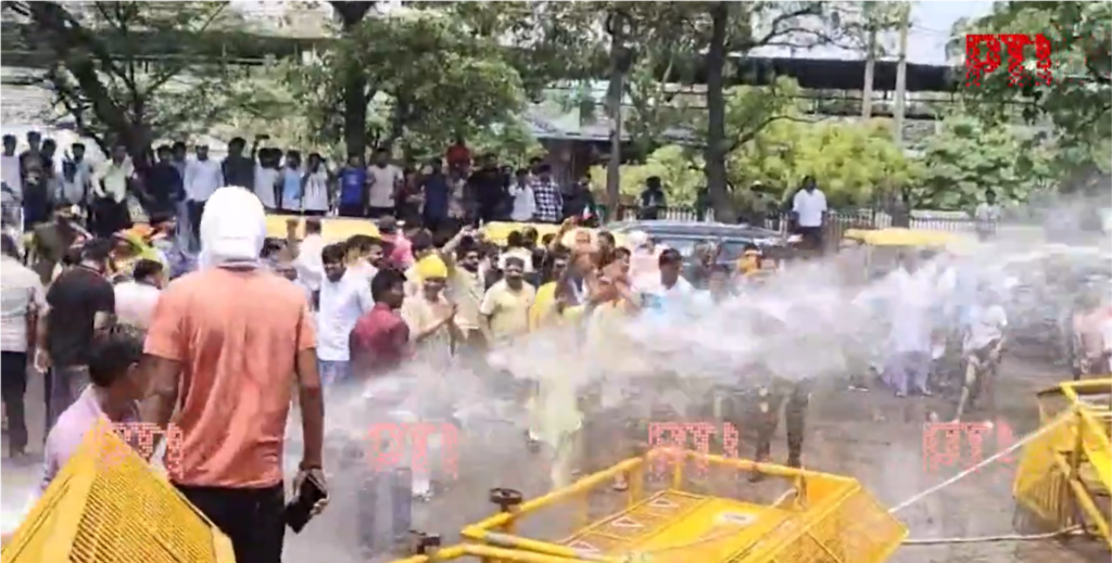 delhi police uses water cannon on water shortage protestors